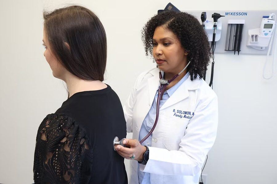 Dr. Solomon with patient